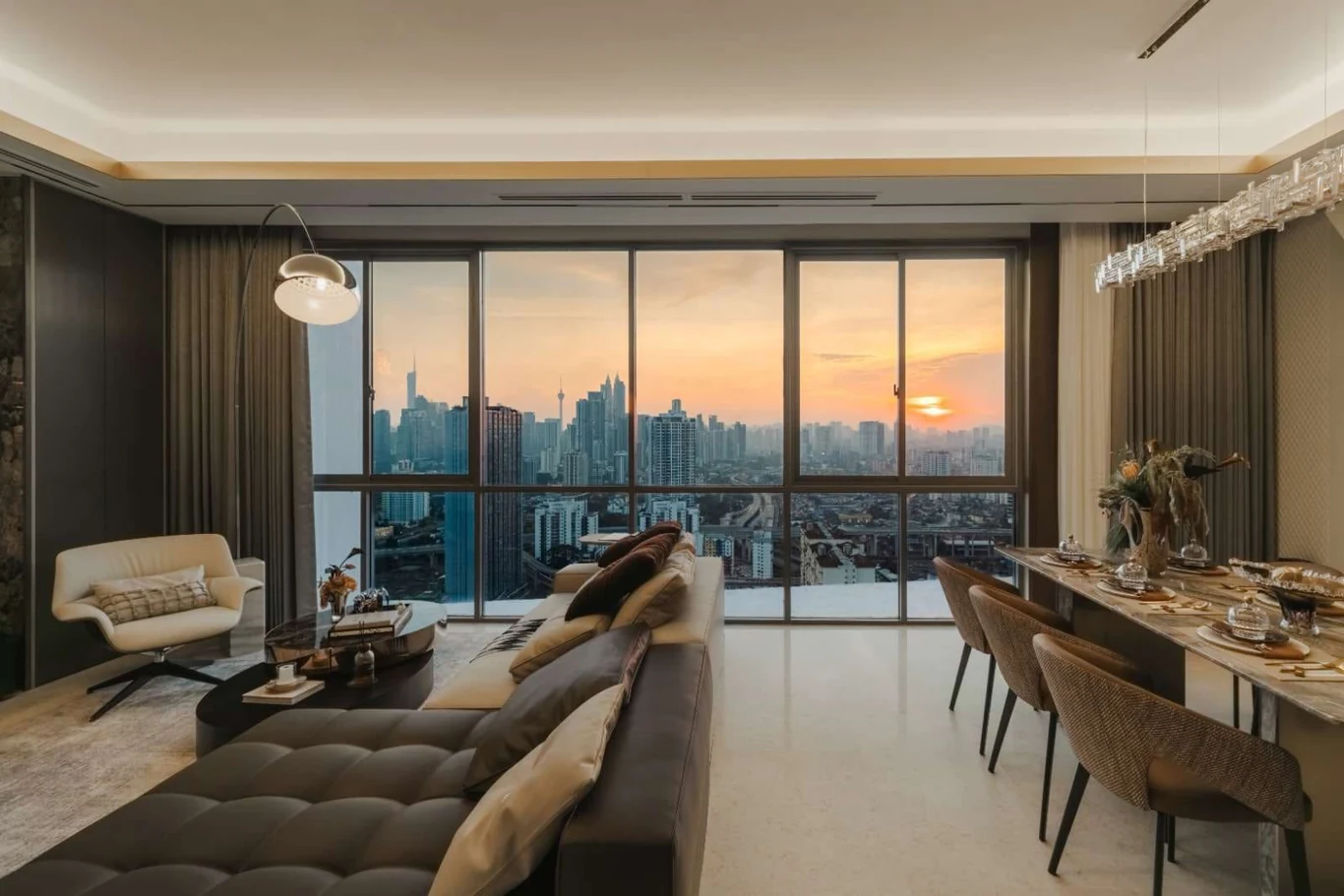 Type C show unit living room at Cappella Embassy at sunset, full-height glazing over Kuala Lumpur , show unit photograph